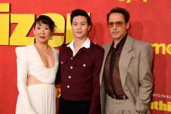 LOS ANGELES, CALIFORNIA - APRIL 09: (L-R) Sandra Oh, Hoa Xuande and Robert Downey Jr. attend HBO's "The Sympathizer" Red Carpet Premiere Event at Paramount Theater on April 09, 2024 in Los Angeles, California.  (Photo by FilmMagic/FilmMagic for HBO)