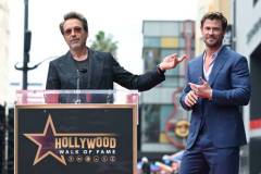 Robert Downey Jr. and Chris Hemsworth during the ceremony honoring Chris Hemsworth with a Star on the Hollywood Walk of Fame on May 23, 2024 in Los Angeles, California. (Photo by Gilbert Flores/Variety via Getty Images)