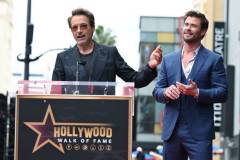 Robert Downey Jr. and Chris Hemsworth during the ceremony honoring Chris Hemsworth with a Star on the Hollywood Walk of Fame on May 23, 2024 in Los Angeles, California. (Photo by Gilbert Flores/Variety via Getty Images)