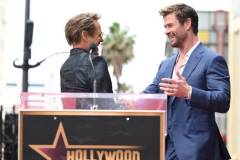 Robert Downey Jr. and Chris Hemsworth during the ceremony honoring Chris Hemsworth with a Star on the Hollywood Walk of Fame on May 23, 2024 in Los Angeles, California. (Photo by Gilbert Flores/Variety via Getty Images)