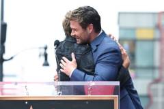 Robert Downey Jr. and Chris Hemsworth during the ceremony honoring Chris Hemsworth with a Star on the Hollywood Walk of Fame on May 23, 2024 in Los Angeles, California. (Photo by Gilbert Flores/Variety via Getty Images)