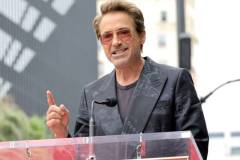 HOLLYWOOD, CALIFORNIA - MAY 23: Robert Downey Jr. speaks during the Hollywood Walk of Fame Star Ceremony honoring Chris Hemsworth on May 23, 2024 in Hollywood, California. (Photo by Kevin Winter/Getty Images)
