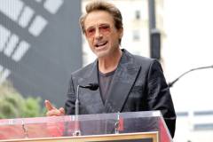 HOLLYWOOD, CALIFORNIA - MAY 23: Robert Downey Jr. speaks during the Hollywood Walk of Fame Star Ceremony honoring Chris Hemsworth on May 23, 2024 in Hollywood, California. (Photo by Kevin Winter/Getty Images)
