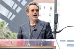 HOLLYWOOD, CALIFORNIA - MAY 23: Robert Downey Jr. speaks during the Hollywood Walk of Fame Star Ceremony honoring Chris Hemsworth on May 23, 2024 in Hollywood, California. (Photo by Kevin Winter/Getty Images)