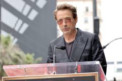 HOLLYWOOD, CALIFORNIA - MAY 23: Robert Downey Jr. speaks during the Hollywood Walk of Fame Star Ceremony honoring Chris Hemsworth on May 23, 2024 in Hollywood, California. (Photo by Kevin Winter/Getty Images)