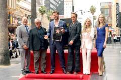 HOLLYWOOD, CALIFORNIA - MAY 23: (L-R) Steven Nissen, President & CEO, Hollywood Chamber of Commerce, George Miller, Chris Hemsworth, Robert Downey Jr. and Sarah Zurell, Incoming Chair of the Board, HCC attend the Hollywood Walk of Fame Star Ceremony honoring Chris Hemsworth on May 23, 2024 in Hollywood, California. (Photo by Kevin Winter/Getty Images)