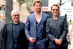 HOLLYWOOD, CALIFORNIA - MAY 23: (L-R) George Miller, Chris Hemsworth, Robert Downey Jr. attend the Hollywood Walk of Fame Star Ceremony honoring Chris Hemsworth on May 23, 2024 in Hollywood, California. (Photo by Kevin Winter/Getty Images)