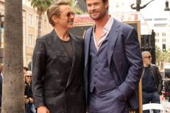 HOLLYWOOD, CALIFORNIA - MAY 23: (L-R) Robert Downey Jr. and Chris Hemsworth attend the Hollywood Walk of Fame Star Ceremony honoring Chris Hemsworth on May 23, 2024 in Hollywood, California. (Photo by Kevin Winter/Getty Images)