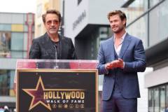 HOLLYWOOD, CALIFORNIA - MAY 23: Robert Downey Jr. (L) and Chris Hemsworth seen at the ceremony honoring Chris Hemsworth with a Star on the Hollywood Walk of Fame on May 23, 2024 in Hollywood, California. (Photo by Eric Charbonneau/Getty Images for Warner Bros.)