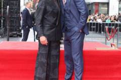 HOLLYWOOD, CALIFORNIA - MAY 23: Robert Downey Jr. (L) and Chris Hemsworth seen at the ceremony honoring Chris Hemsworth with a Star on the Hollywood Walk of Fame on May 23, 2024 in Hollywood, California. (Photo by Eric Charbonneau/Getty Images for Warner Bros.)