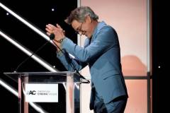 BEVERLY HILLS, CALIFORNIA - DECEMBER 06: Robert Downey Jr. speaks onstage during the 38th Annual American Cinematheque Awards at The Beverly Hilton on December 06, 2024 in Beverly Hills, California.  (Photo by Presley Ann/Getty Images for American Cinematheque)