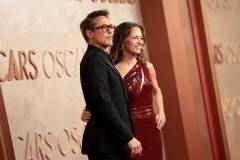 HOLLYWOOD, CALIFORNIA - MARCH 02: (L-R) Robert Downey Jr. and Susan Downey attend the 97th Annual Oscars at Dolby Theatre on March 02, 2025 in Hollywood, California. (Photo by Monica Schipper/Getty Images)