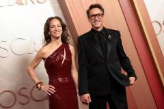 HOLLYWOOD, CALIFORNIA - MARCH 02: (L-R) Susan Downey and Robert Downey Jr. attend the 97th Annual Oscars at Dolby Theatre on March 02, 2025 in Hollywood, California. (Photo by Monica Schipper/Getty Images)