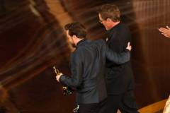 HOLLYWOOD, CALIFORNIA - MARCH 02: (L-R) Kieran Culkin accepts the Best Actor In A Supporting Role award for "A Real Pain" from Robert Downey Jr. onstage during the 97th Annual Oscars at Dolby Theatre on March 02, 2025 in Hollywood, California.  (Photo by Kevin Winter/Getty Images)