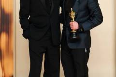 HOLLYWOOD, CALIFORNIA - MARCH 02: (L-R) Robert Downey Jr. and Kieran Culkin, winner of the Actor in a Supporting Role award for ?A Real Pain?, poses in the press room during the 97th Annual Oscars at Ovation Hollywood on March 02, 2025 in Hollywood, California. (Photo by Arturo Holmes/WireImage)