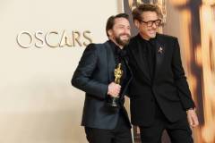HOLLYWOOD, CALIFORNIA - MARCH 02: (L-R) Kieran Culkin, winner of the Actor in a Supporting Role award for ?A Real Pain?, and Robert Downey Jr. pose in the press room during the 97th Annual Oscars at Ovation Hollywood on March 02, 2025 in Hollywood, California. (Photo by Arturo Holmes/WireImage)