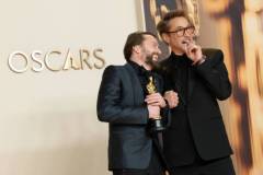 HOLLYWOOD, CALIFORNIA - MARCH 02: (L-R) Kieran Culkin, winner of the Actor in a Supporting Role award for ?A Real Pain?, and Robert Downey Jr. pose in the press room during the 97th Annual Oscars at Ovation Hollywood on March 02, 2025 in Hollywood, California. (Photo by Arturo Holmes/WireImage)