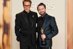 HOLLYWOOD, CALIFORNIA - MARCH 02: Kieran Culkin (R), winner of the Best Actor In A Supporting Role for ?A Real Pain?, and Robert Downey Jr. (L) pose in the press room during the 97th Annual Oscars at Ovation Hollywood on March 02, 2025 in Hollywood, California. (Photo by Mike Coppola/Getty Images)