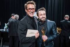 HOLLYWOOD, CALIFORNIA - MARCH 02: (EDITORIAL ONLY, NO BOOK COVERS) (L-R) Robert Downey Jr. and Kieran Culkin are seen backstage during the 97th Annual Oscars at Dolby Theatre on March 02, 2025 in Hollywood, California. (Photo by John Shearer/97th Oscars/The Academy via Getty Images)