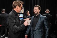 HOLLYWOOD, CALIFORNIA - MARCH 02: (EDITORIAL ONLY, NO BOOK COVERS) (L-R) Robert Downey Jr. and Kieran Culkin are seen backstage during the 97th Annual Oscars at Dolby Theatre on March 02, 2025 in Hollywood, California. (Photo by John Shearer/97th Oscars/The Academy via Getty Images)