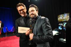 HOLLYWOOD, CALIFORNIA - MARCH 02: In this handout photo provided by The Academy, (L-R) Robert Downey Jr. and Kieran Culkin pose backstage during the 97th Annual Oscars at Dolby Theatre on March 02, 2025 in Hollywood, California.  (Photo by Richard Harbaugh/The Academy via Getty Images)