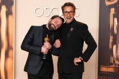 HOLLYWOOD, CALIFORNIA - MARCH 02: (L-R) Kieran Culkin, winner of the Best Actor in a Supporting Role award for "A Real Pain,? and Robert Downey Jr. pose in the press room during the 97th Annual Oscars at Dolby Theatre on March 02, 2025 in Hollywood, California. (Photo by Jeff Kravitz/FilmMagic)