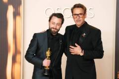 HOLLYWOOD, CALIFORNIA - MARCH 02: (L-R) Kieran Culkin, winner of the Best Actor in a Supporting Role award for "A Real Pain,? and Robert Downey Jr. pose in the press room during the 97th Annual Oscars at Dolby Theatre on March 02, 2025 in Hollywood, California. (Photo by Jeff Kravitz/FilmMagic)