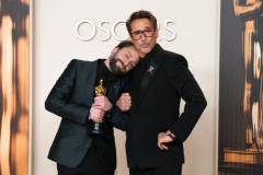 HOLLYWOOD, CALIFORNIA - MARCH 02: (L-R) Kieran Culkin, winner of the Best Actor in a Supporting Role award for "A Real Pain,? and Robert Downey Jr. pose in the press room during the 97th Annual Oscars at Dolby Theatre on March 02, 2025 in Hollywood, California. (Photo by Jeff Kravitz/FilmMagic)