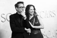 HOLLYWOOD, CALIFORNIA - MARCH 02: (EDITOR'S NOTE: Image has been converted to black and white.) (L-R) Robert Downey Jr. and Susan Downey attend the 97th Annual Oscars at Dolby Theatre on March 02, 2025 in Hollywood, California. (Photo by Chelsea Guglielmino/FilmMagic)