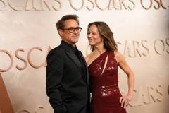 HOLLYWOOD, CALIFORNIA - MARCH 02: (L-R) Robert Downey Jr. and Susan Downey attend the 97th Annual Oscars at Dolby Theatre on March 02, 2025 in Hollywood, California. (Photo by Chelsea Guglielmino/FilmMagic)