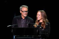 LOS ANGELES, CALIFORNIA - OCTOBER 18: (FOR EDITORIAL USE ONLY) (L-R) Robert Downey Jr. and Susan Downey speak onstage during the Academy Museum 5th Annual Gala in Partnership with Rolex at Academy Museum of Motion Pictures on October 18, 2025 in Los Angeles, California. (Photo by Stefanie Keenan/Oscars/Getty Images for  Academy Museum of Motion Pictures)