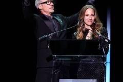 LOS ANGELES, CALIFORNIA - OCTOBER 18: (FOR EDITORIAL USE ONLY) (L-R) Robert Downey Jr. and Susan Downey speak onstage during the Academy Museum 5th Annual Gala in Partnership with Rolex at Academy Museum of Motion Pictures on October 18, 2025 in Los Angeles, California. (Photo by Stefanie Keenan/Oscars/Getty Images for  Academy Museum of Motion Pictures)