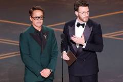 Robert Downey Jr. and Chris Evans at the 98th Annual Oscars held at Dolby Theatre on March 15, 2026 in Hollywood, California. (Photo by Rich Polk/Penske Media via Getty Images)
