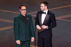 Robert Downey Jr. and Chris Evans at the 98th Annual Oscars held at Dolby Theatre on March 15, 2026 in Hollywood, California. (Photo by Rich Polk/Penske Media via Getty Images)
