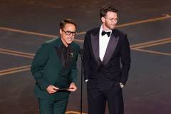 Robert Downey Jr. and Chris Evans at the 98th Annual Oscars held at Dolby Theatre on March 15, 2026 in Hollywood, California. (Photo by Rich Polk/Penske Media via Getty Images)