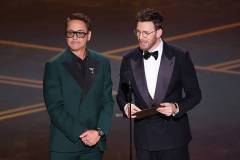 Robert Downey Jr. and Chris Evans at the 98th Annual Oscars held at Dolby Theatre on March 15, 2026 in Hollywood, California. (Photo by Rich Polk/Penske Media via Getty Images)