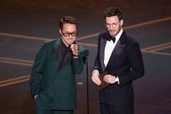 Robert Downey Jr. and Chris Evans at the 98th Annual Oscars held at Dolby Theatre on March 15, 2026 in Hollywood, California. (Photo by Rich Polk/Penske Media via Getty Images)