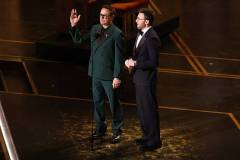 HOLLYWOOD, CALIFORNIA - MARCH 15: (L-R) Robert Downey Jr. and Chris Evans speak onstage during the 98th Oscars at Dolby Theatre on March 15, 2026 in Hollywood, California. (Photo by Kevin Winter/Getty Images)
