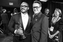 HOLLYWOOD, CALIFORNIA - MARCH 15:  (EDITORS NOTE: Image has been converted to black and white.) (L-R) Ryan Coogler and Robert Downey Jr. attend the 98th Annual Oscars at Dolby Theatre on March 15, 2026 in Hollywood, California. (Photo by John Shearer/98th Oscars/Getty Images The Academy via Getty Images)