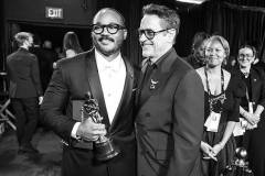 HOLLYWOOD, CALIFORNIA - MARCH 15:  (EDITORS NOTE: Image has been converted to black and white.) (L-R) Ryan Coogler and Robert Downey Jr. attend the 98th Annual Oscars at Dolby Theatre on March 15, 2026 in Hollywood, California. (Photo by John Shearer/98th Oscars/Getty Images The Academy via Getty Images)